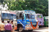 RTO officials stop few buses for not issuing tickets as a warning
